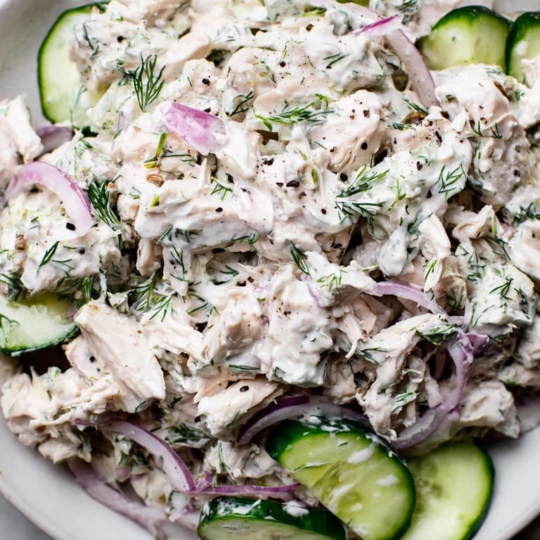 Tender chicken and crunchy cucumbers tossed in a tangy yogurt dressing make a vibrant, high-protein creamy cucumber chicken salad.